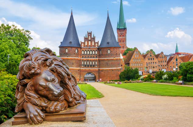 Lion statue beside Holstein Gate at Lubeck. Germany