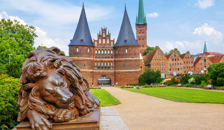 Lion statue beside Holstein Gate at Lubeck. Germany