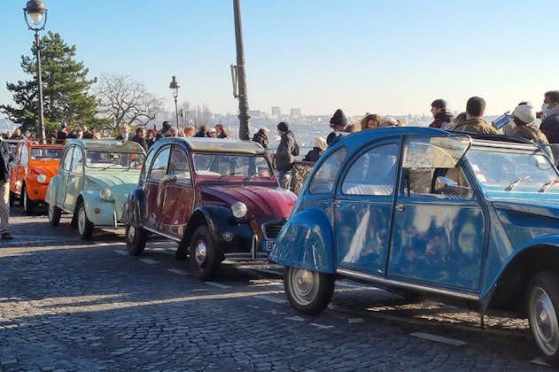 Discover Paris in a 2CV with a glass of champagne... 3 passengers!
