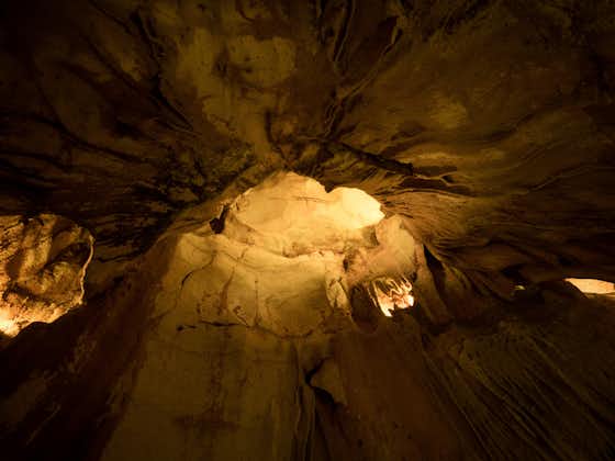Illuminated lit lights stalagmites stalactites limestone show cave cavern Grutas da Moeda in Batalha Leiria Portugal