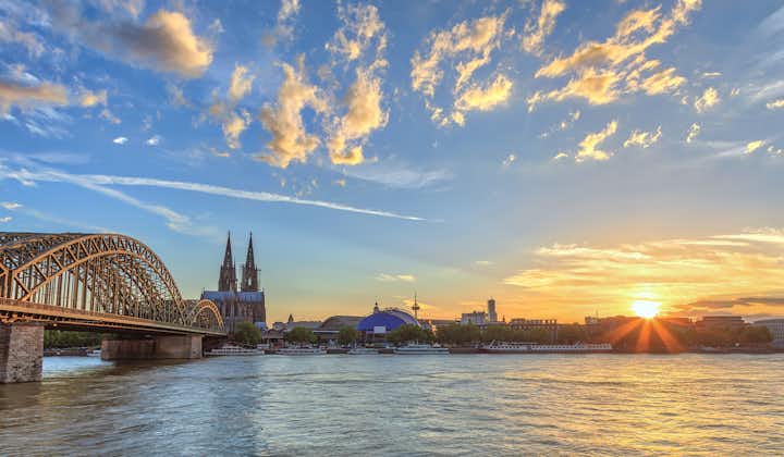 Photo of Cologne sunset city skyline with Cologne Cathedral and Rhine River, Cologne, Germany.