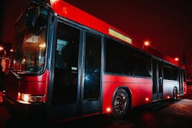 Excursão noturna de ônibus pelo partido de Riga