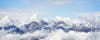 photo of aerial panoramic view of Snowy Nordkette mountain of Innsbruck, Austria.