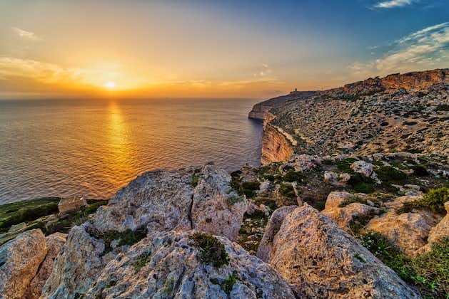 Photo of the mediterranean sea from the Dingli Cliffs (Rdum ta' Had-Dingli) at beautiful sunset in Malta.