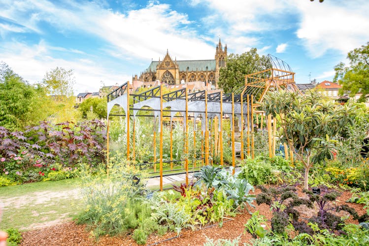 Photo of beautiful garden on Comedy square with cathedral on the background in Metz city, France.