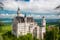 Photo of summer landscape of the famous tourist attraction in the Bavarian Alps, the 19th century Neuschwanstein castle, Germany.