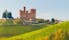 Castle of Grinzane Cavour surrounded by vineyards in the Langhe region, Piedmont, Italy
