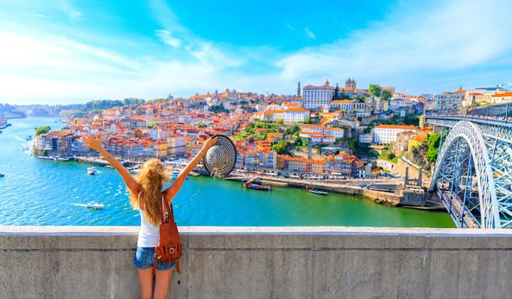 Photo of cityscape panoramic view of Happy traveler woman in Porto.