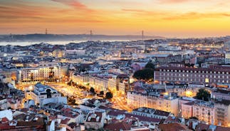 Photo of Lisbon City Skyline with Sao Jorge Castle and the Tagus River, Portugal.