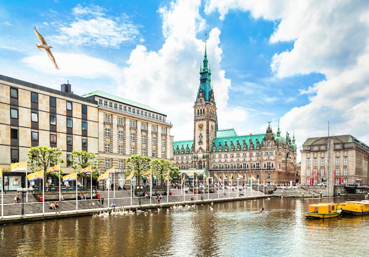 Photo of beautiful view of Hamburg city center with town hall and Alster river, Germany.