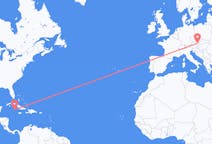 Flyreiser fra Lille Cayman, Caymanøyene til Wien, Østerrike