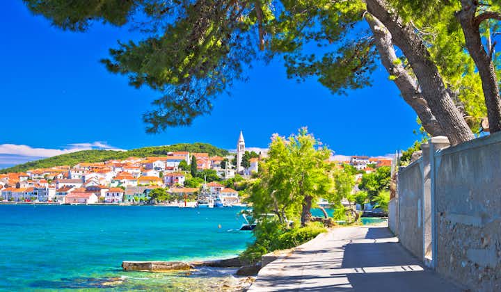 Photo of Zadar archipelago. Kali on Ugljan island turquoise sea and walkway view.