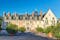 photo of Chateau Royal de Blois, facade of the Louis XII wing, France. This old castle is landmark of Loire Valley and located in Blois city. French palace of Renaissance in summer.