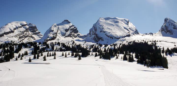 winter mountain landscape with three impressive peaks.
