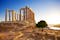 Photo of ruins of an ancient Greek temple of Poseidon before sunset, Greece.