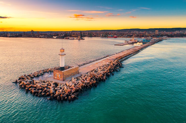 Photo of aerial view of lighthouse at sunset in Varna, Bulgaria.