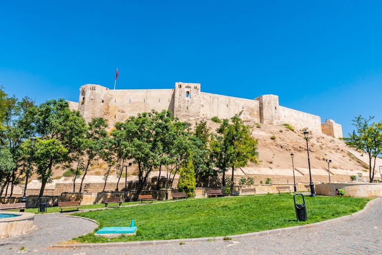 Photo of Gaziantep Kalesi Castle Breathtaking Picturesque Frontal View on a Blue Sky Day in Summer.
