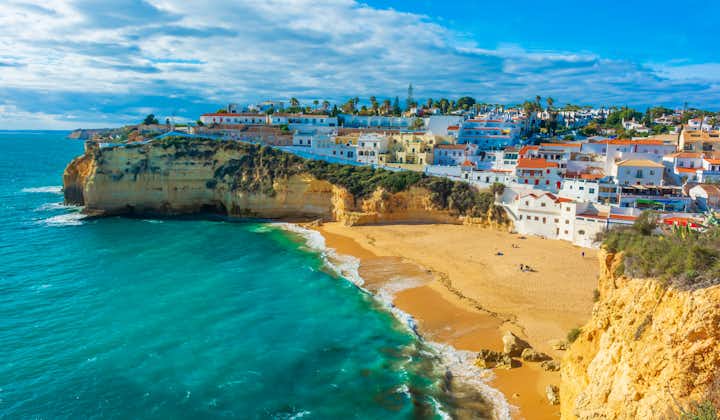Photo of beautiful beach Faro District, Portugal.