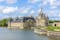 photo of the famous Chateau de Chantilly (Chantilly Castle, 1560) at beautiful morning, is a historic chateau located in town of Chantilly, France.