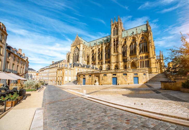 Photo of street view on the central square with famous cathedral in Metz city in Lorraine region of France.