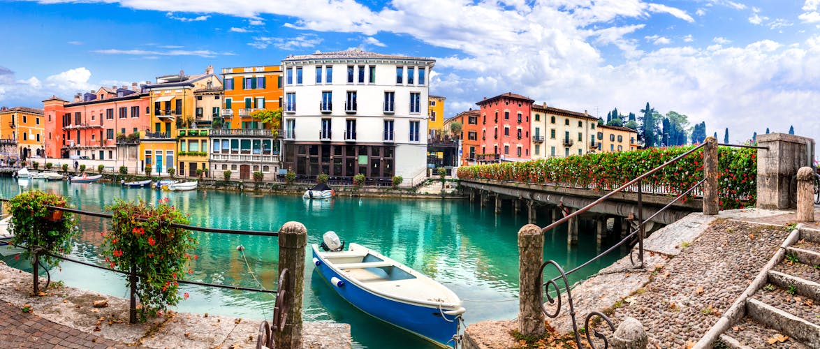 Photo of Peschiera del Garda - charming village with colorful houses in beautiful lake Lago di Garda. Verona province, Italy.