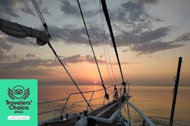 Sunset South Coast Sail Cruise með hádegismat, drykki, valfrjáls flutning