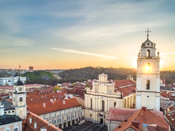 The church of St. Johns and Vilnius old town panorama in morning taken from drone/