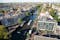 Photo of aerial view from the Westerkerk to the Anne Frank House and Canal with boats in Amsterdam.