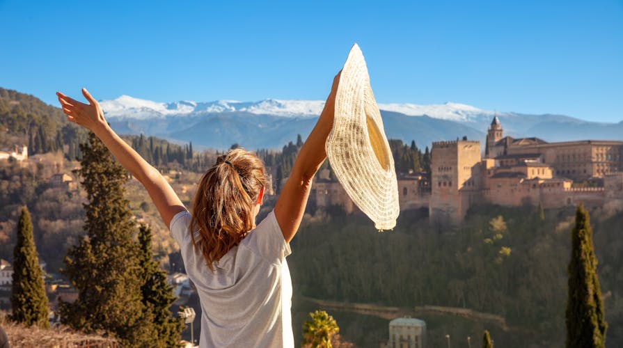 Photo of happy woman travel in Spain, Andalousia, Granada, Alhambra.