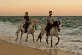 Montar a caballo en la playa