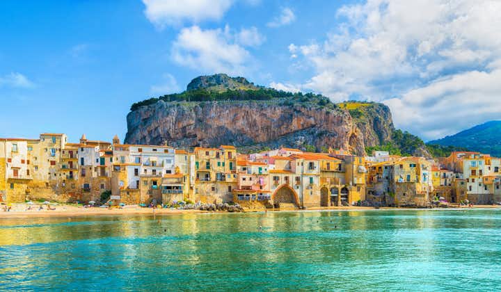 Photo of Cefalu , that has a long and lovely beach with clean, golden sand, Italy.