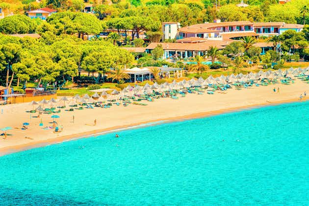 Shore of Beautiful Villasimius Beach at the Bay of the Blue Waters of the Mediterranean Sea at Sardinia Island in Italy in summer. Cagliari region.
