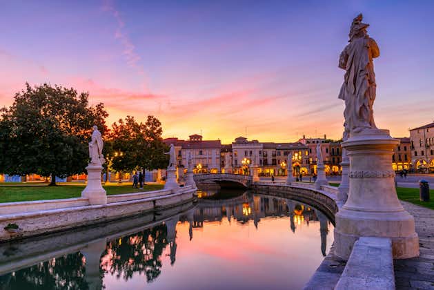 photo of view View of the canal with statues on Prato della Valle in Padova (Padua), Veneto, Italy.