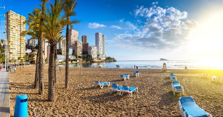 Photo of panoramic seascape view of summer resort with beach(Playa de Llevant) and famous skyscrapers. Costa Blanca. City of Benidorm, Alicante, Valencia, Spain.