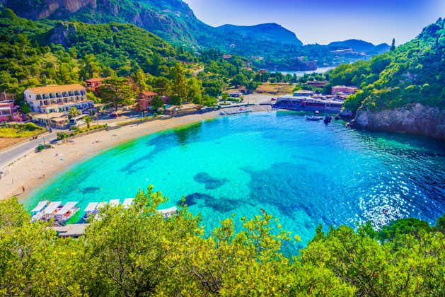 Photo of amazing beach with crystal clear water in Paleokastritsa, Corfu island, Greece.