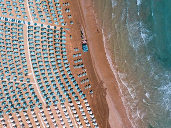 Aerial view of fano with its sea, beaches and umbrellas