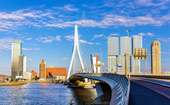 Attractive View of Renowned Erasmusbrug (Swan Bridge) in Rotterdam in front of Port and Harbour. Picture Made At Day. Horizontal Image
