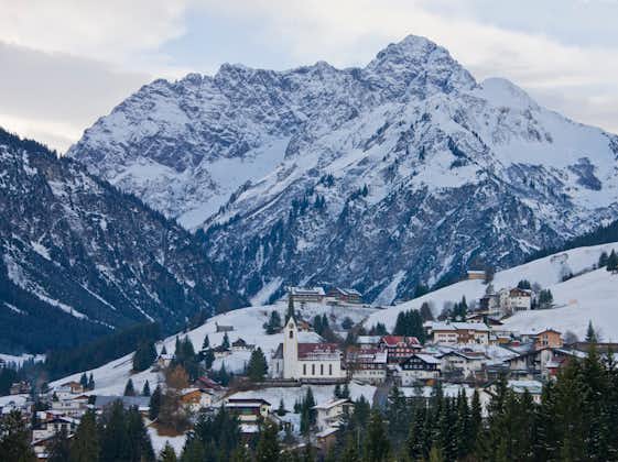 Photo of view to Hirschegg and Grosser Widderstein in winter, Kleinwalsertal, Vorarlberg, Austria.