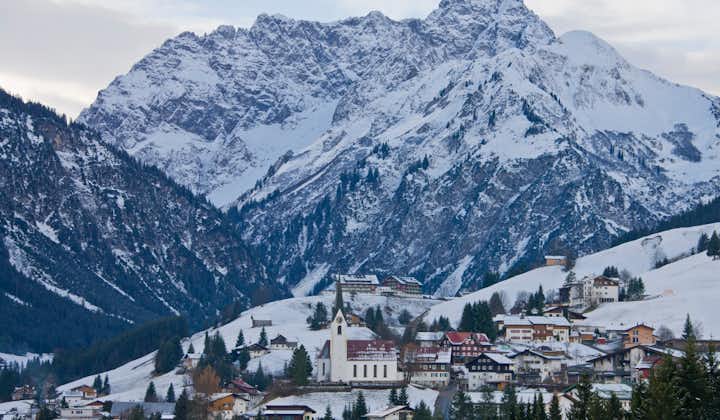 Photo of view to Hirschegg and Grosser Widderstein in winter, Kleinwalsertal, Vorarlberg, Austria.