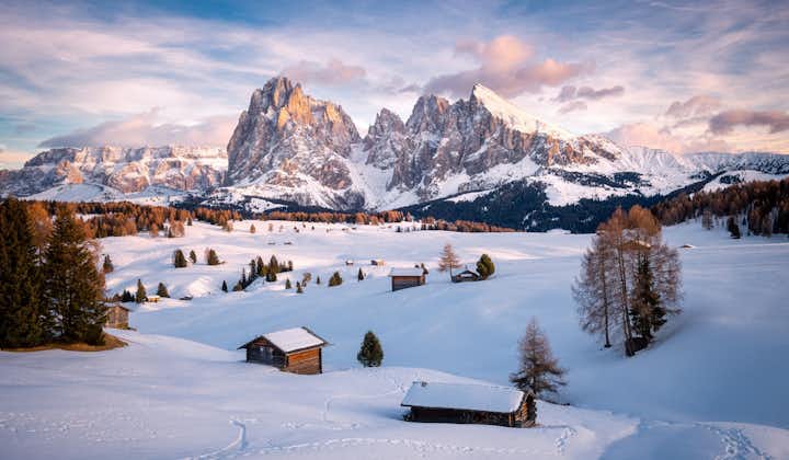 photo of skiing in the Alpe di Siusi with snow in winter, Dolomites, Italy.