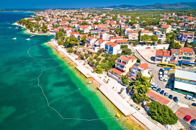 Photo of Brodarica village near Sibenik beach and coastline aerial view, Dalmatia region of Croatia.