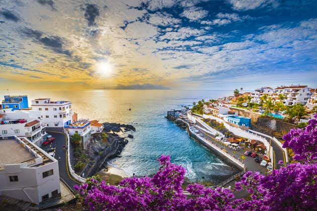 Photo of colorful sunrise in Puerto de Santiago city with amazing beach view, Tenerife, Canary island, Spain