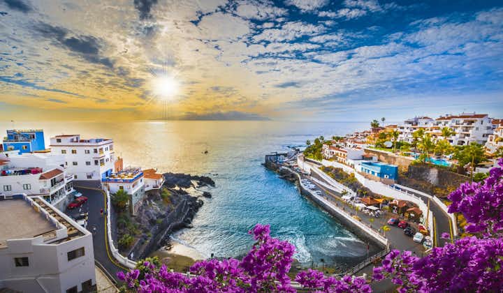 Photo of colorful sunrise in Puerto de Santiago city with amazing beach view, Tenerife, Canary island, Spain