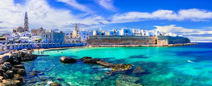 Beautiful white town Monopoli in Puglia with turquoise sea, Italy.