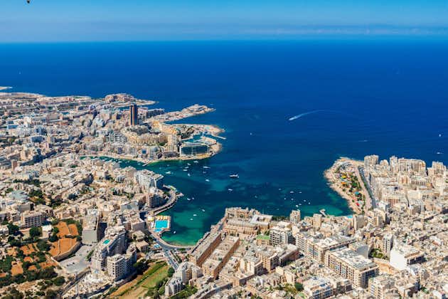 Malta aerial view. St. Julian's (San Giljan) and Tas-Sliema cities. St. Julian’s bay, Balluta bay, Spinola bay, Towns, harbours and coastline of Malta from above. Skyscraper in Paceville district.
