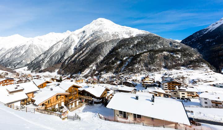 The mountain village at the Austrian ski resort Soelden on a cold and sunny winter day.