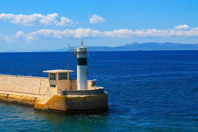Photo of Lighthouse in Piraeus in Greece by Black Iris Visuals