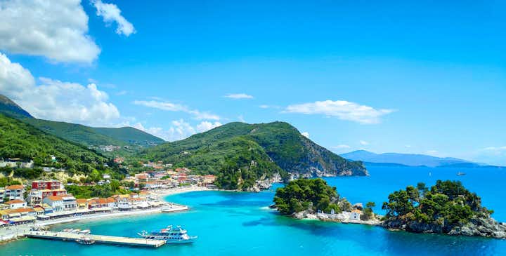 Photo of Parga the Greek Caribbean in Preveza, famous Traditional tropical destination vacation summer tourist attraction with the deep blue ocean of Ionian sea Greece.