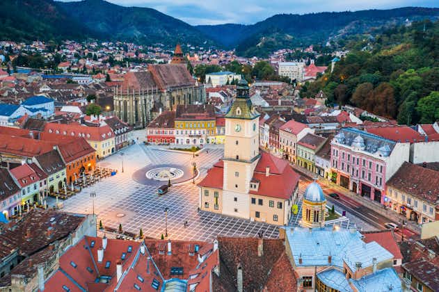 photo of Brasov, Romania. Aerial view of the old town at sunrise.