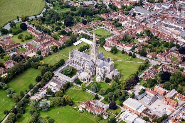 Photo of aerial view over Salisbury and Salisbury Cathedral on a misty summer morning, Salisbury, Wiltshire, England, United Kingdom.